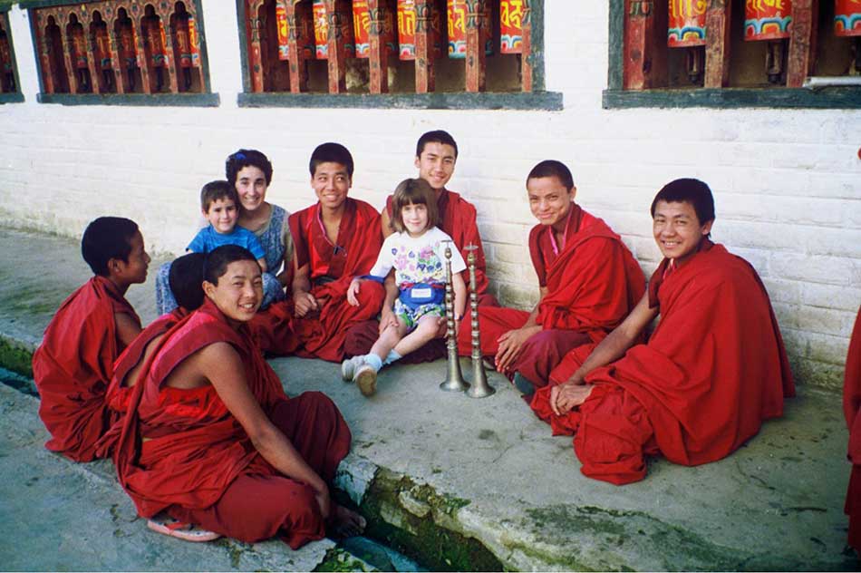 Sue with Emily and Neil and Bhuddhist monks at monastery in Bhutan 4
