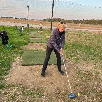 Carolyn Kirkpatrick golfing