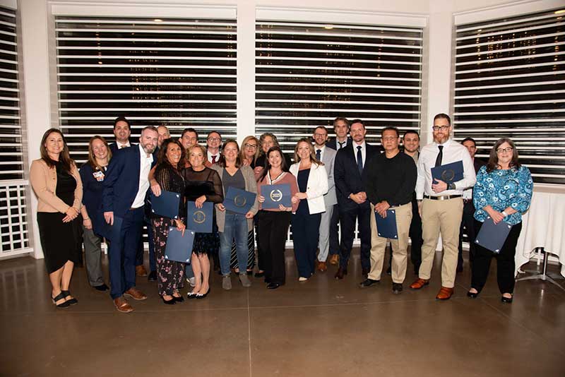 Employees celebrate 15 Year anniversaries, pictured with the leadership teams of Portsmouth Regional Hospital and Frisbie Memorial Hospital.